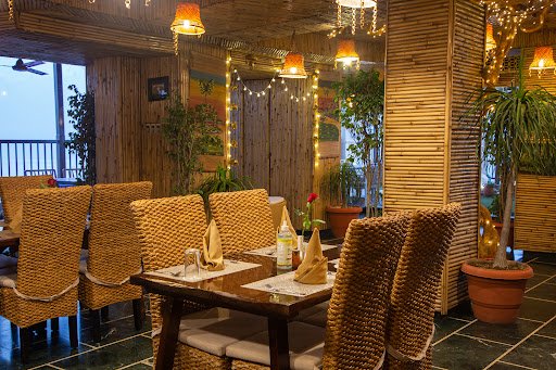 The Sitting Elephant - A Rooftop Restaurant Overlooking River Ganga